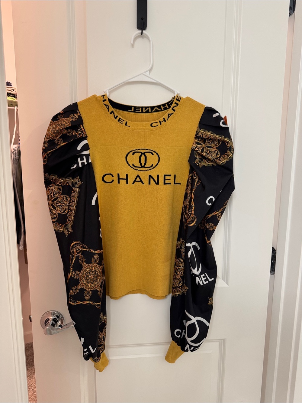 CHANEL Mustard Yellow Knit Sweater with Black Logo-Print Puff Sleeves